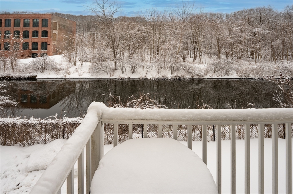 900 Lawrence Street, Unit 5 Lowell, MA 01852 - Photo 30 of 41 a balcony with view of lake