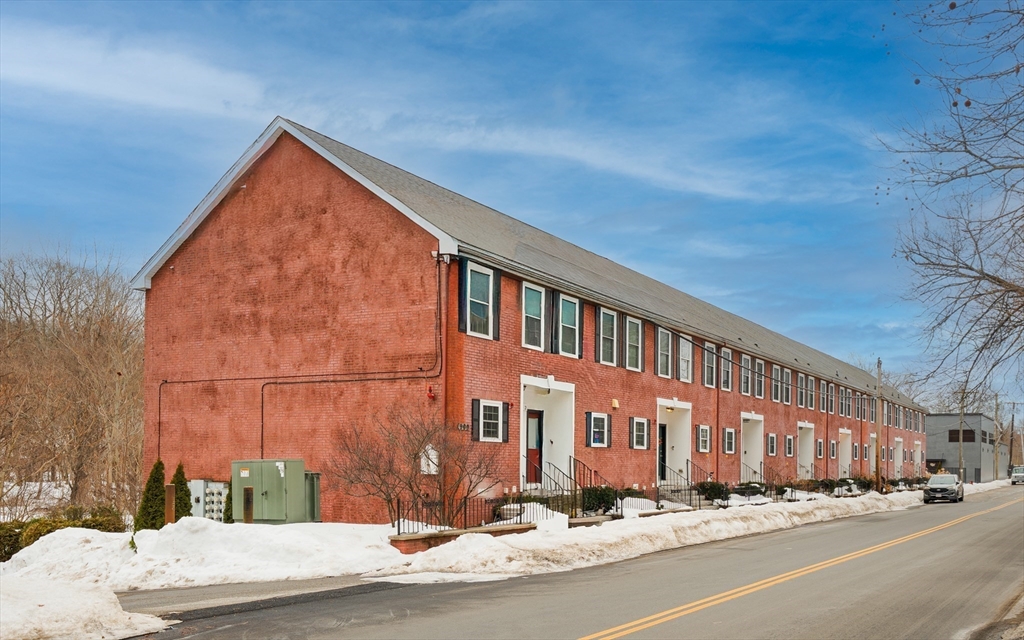 900 Lawrence Street, Unit 5 Lowell, MA 01852 - Photo 32 of 41 a view of a building and a street