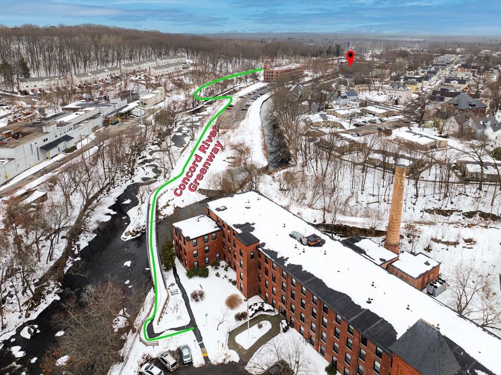 900 Lawrence Street, Unit 5 Lowell, MA 01852 - Photo 36 of 41 a view of a city with a pathway