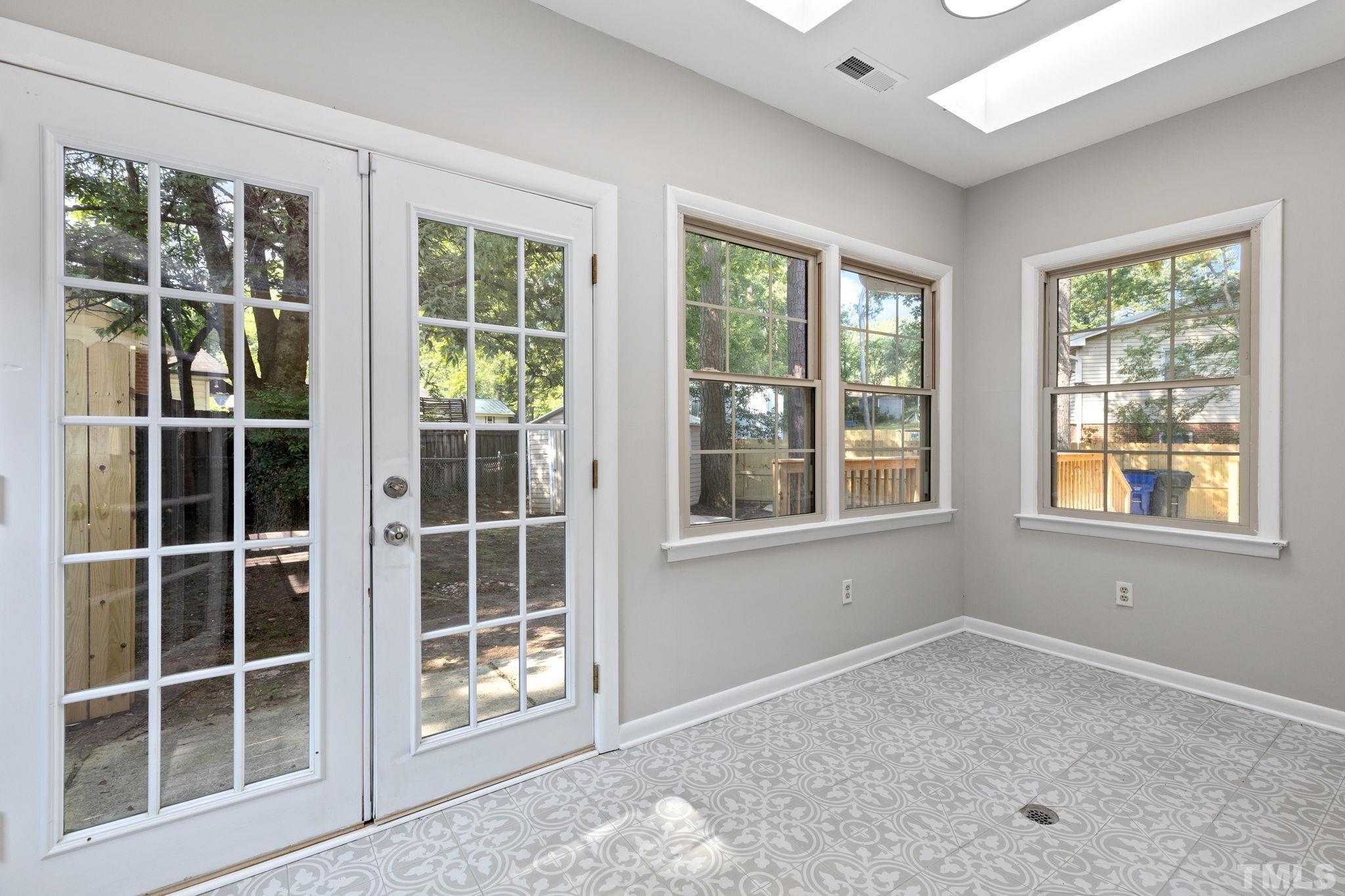 817 Chatham Lane Raleigh, NC 27610 - Photo 15 of 33 a view of an empty room with a window