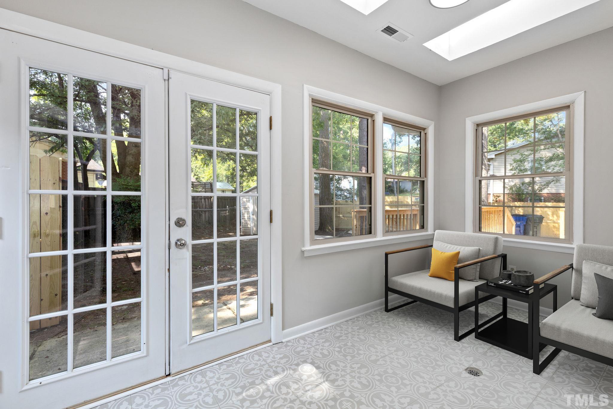 817 Chatham Lane Raleigh, NC 27610 - Photo 17 of 33 a living room with furniture and a window