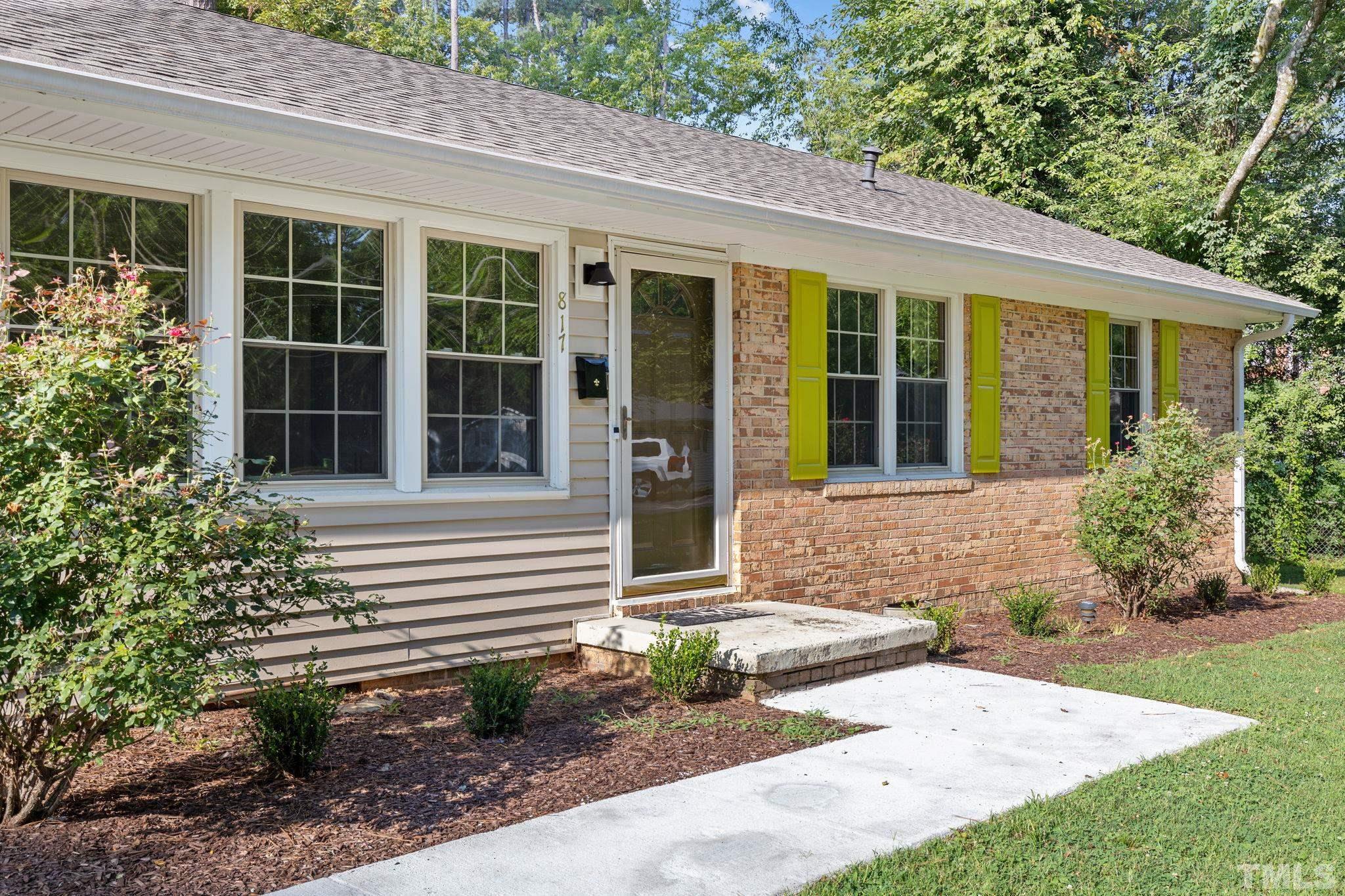 817 Chatham Lane Raleigh, NC 27610 - Photo 3 of 33 a front view of a house with garden