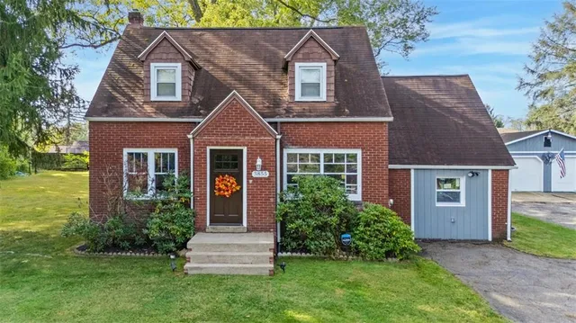 front view of a house with a yard
