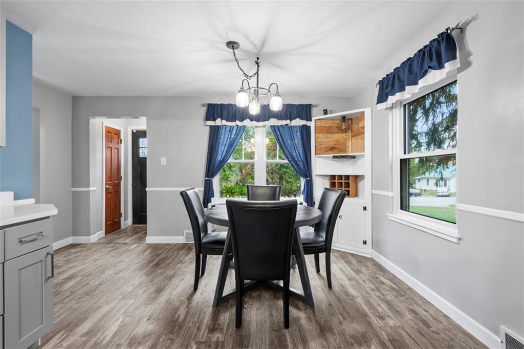 3855 Tuscarawas Road Beaver, PA 15009 - Photo 13 of 45 a view of a dining room with furniture window and wooden floor
