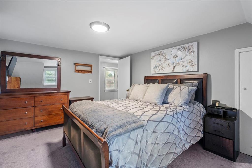 3855 Tuscarawas Road Beaver, PA 15009 - Photo 24 of 45 a bedroom with a bed and a dresser