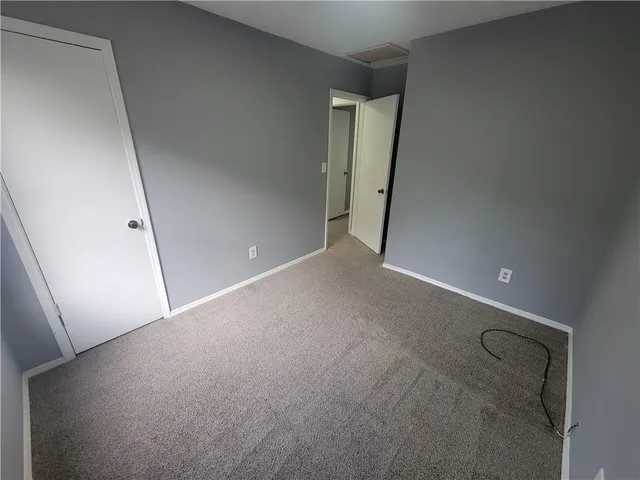 a view of balcony with wooden floor