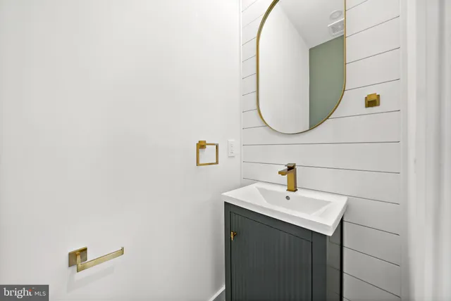 a dining room with furniture and potted plant