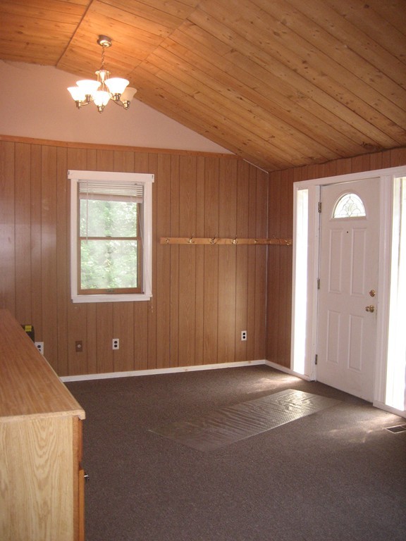 110 Athol Road Phillipston, MA 01331 - Photo 4 of 20 en empty room with windows and ceiling fan