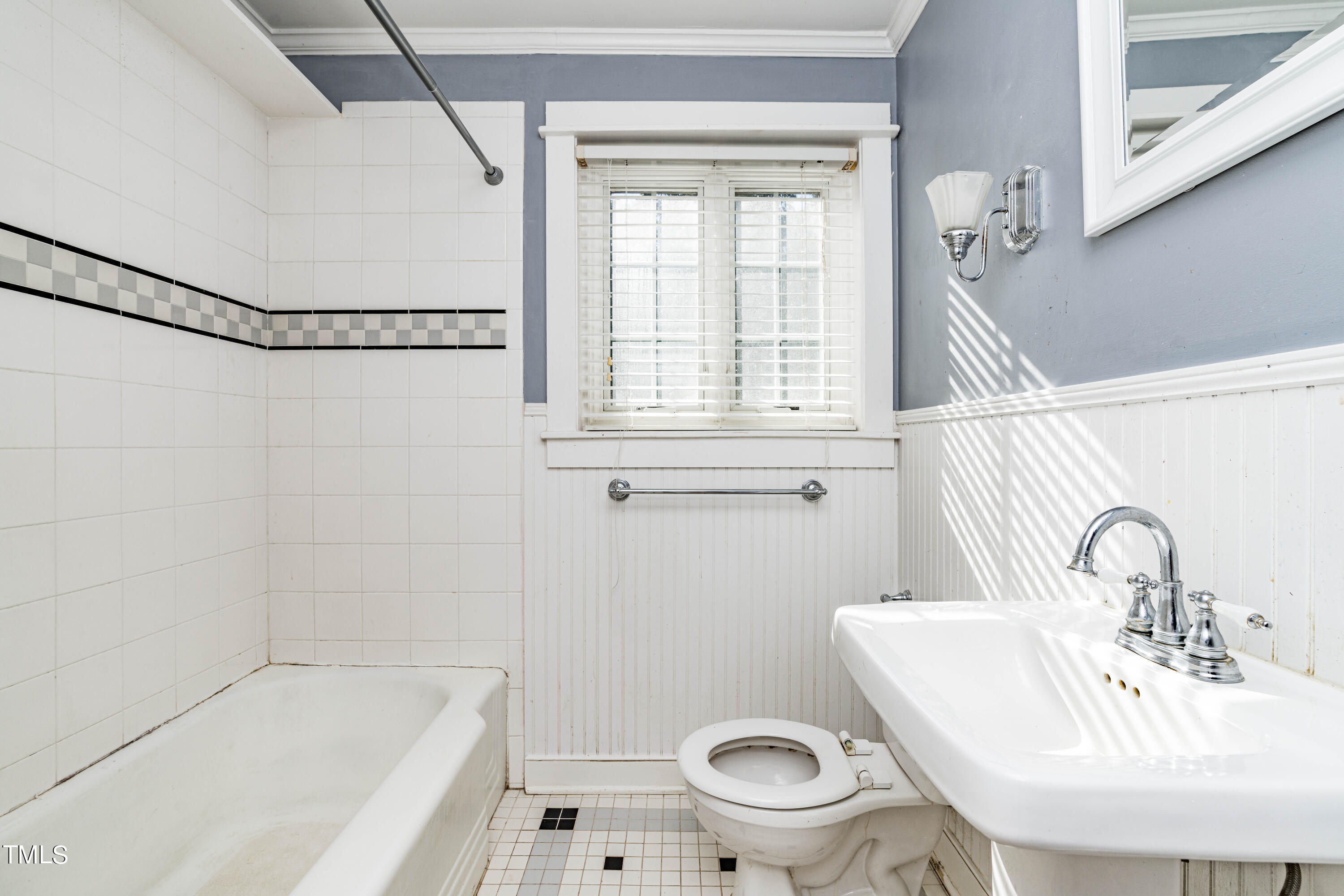 903 Lake Boone Trail Raleigh, NC 27607 - Photo 14 of 25 a bathroom with a sink a toilet and shower