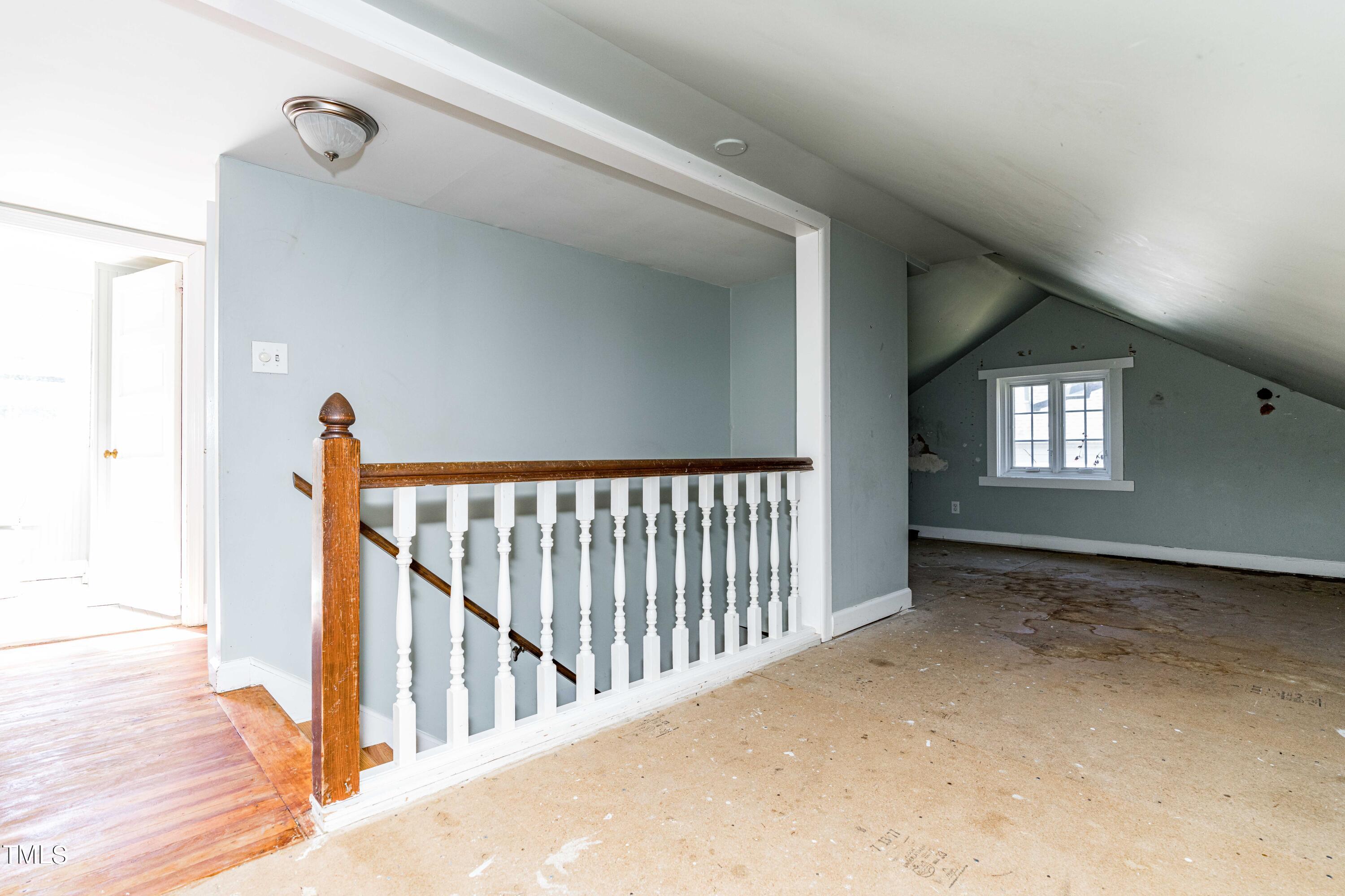 903 Lake Boone Trail Raleigh, NC 27607 - Photo 15 of 25 a view of a hallway with window and stairs