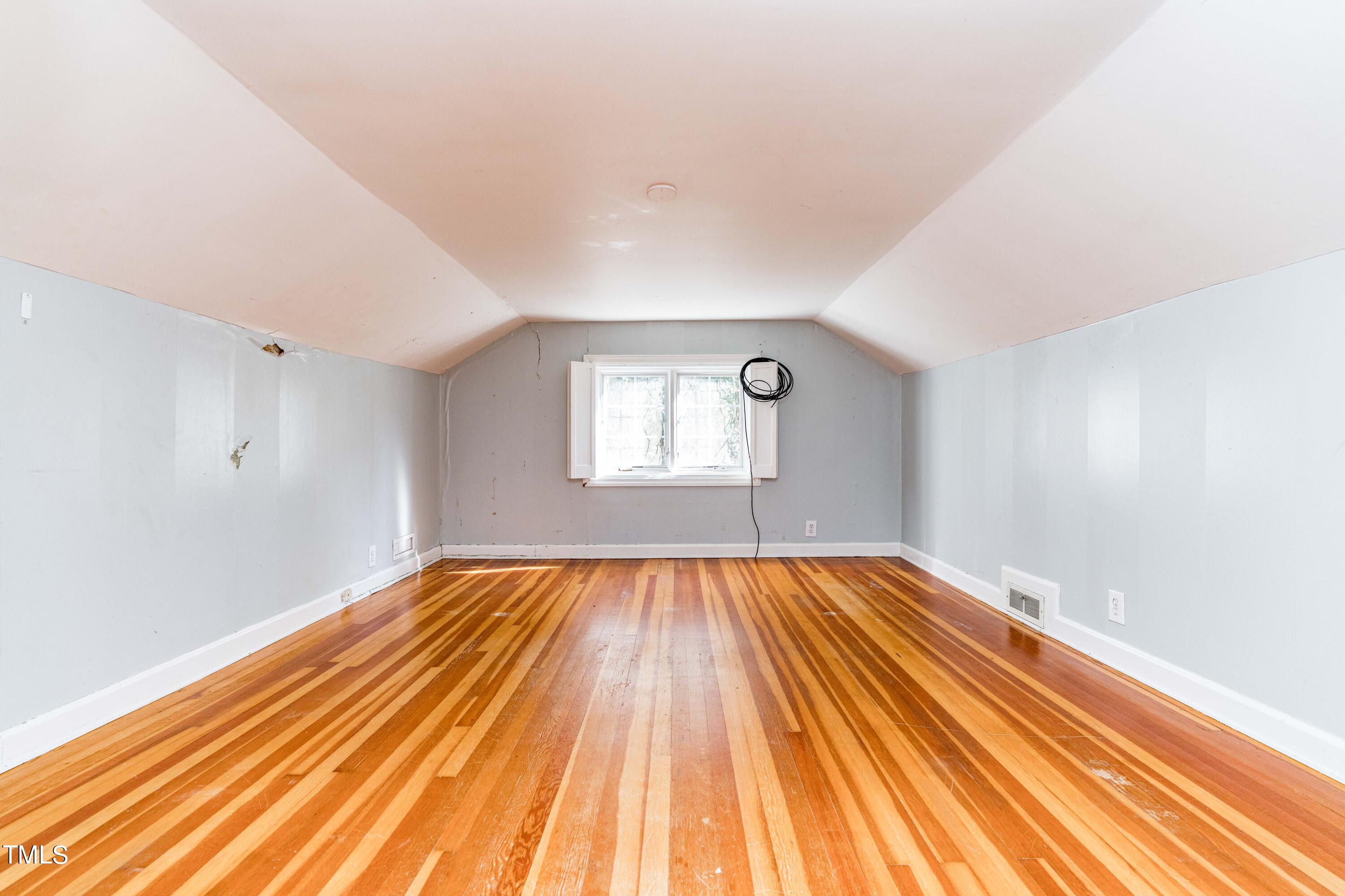 903 Lake Boone Trail Raleigh, NC 27607 - Photo 17 of 25 a view of empty room with wooden floor