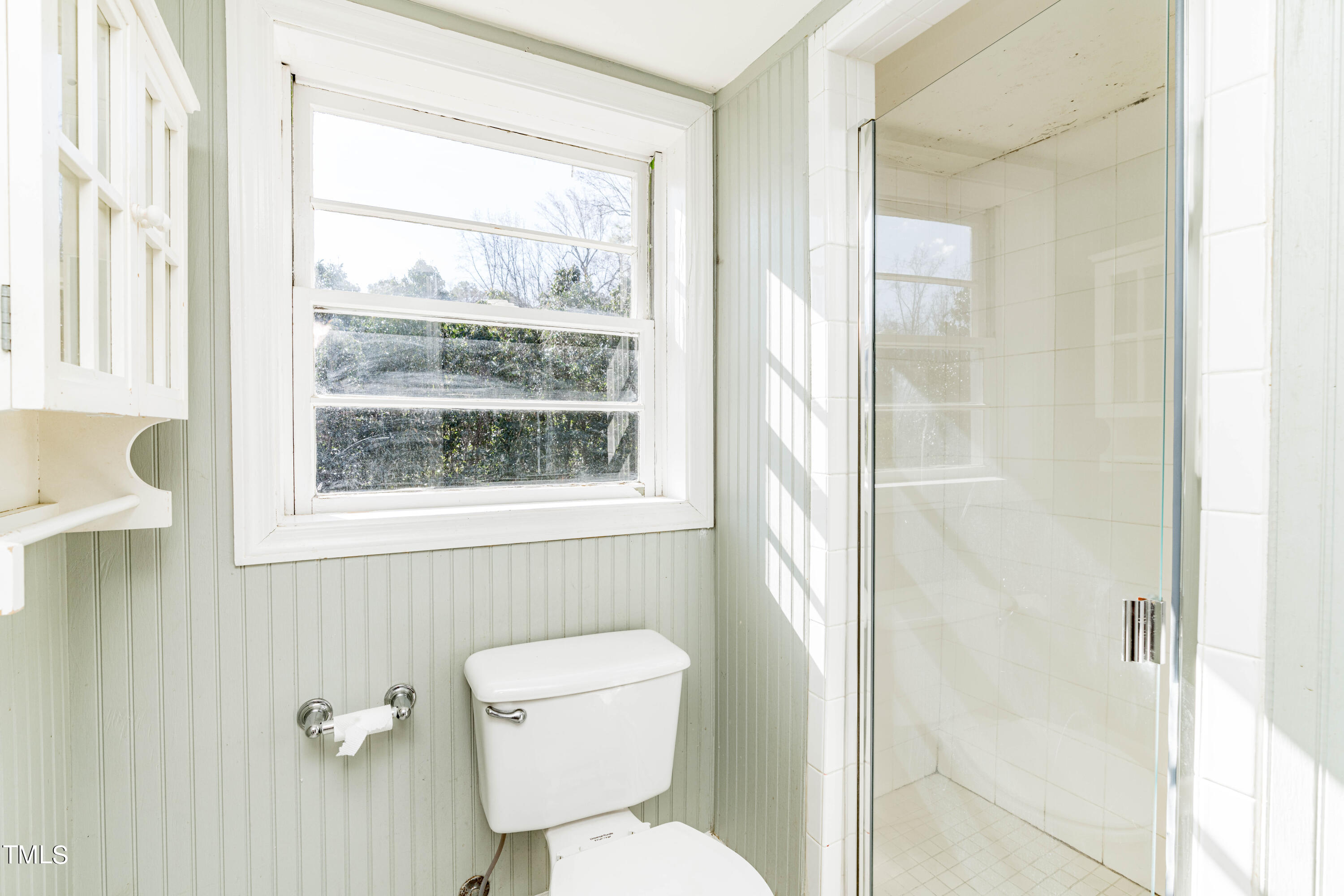 903 Lake Boone Trail Raleigh, NC 27607 - Photo 19 of 25 a bathroom with a toilet a sink and a shower