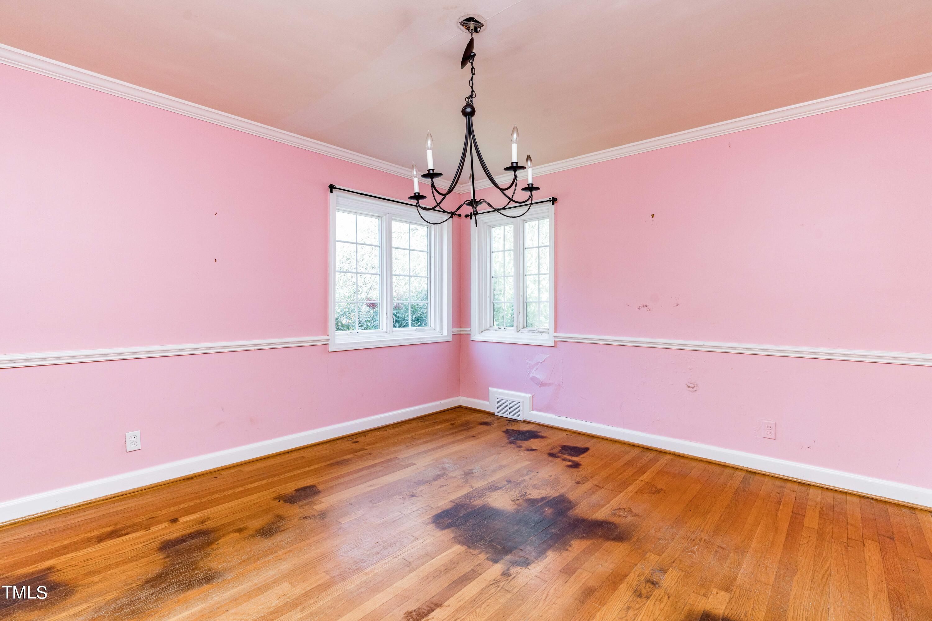 903 Lake Boone Trail Raleigh, NC 27607 - Photo 7 of 25 a view of a room with window and wooden floor