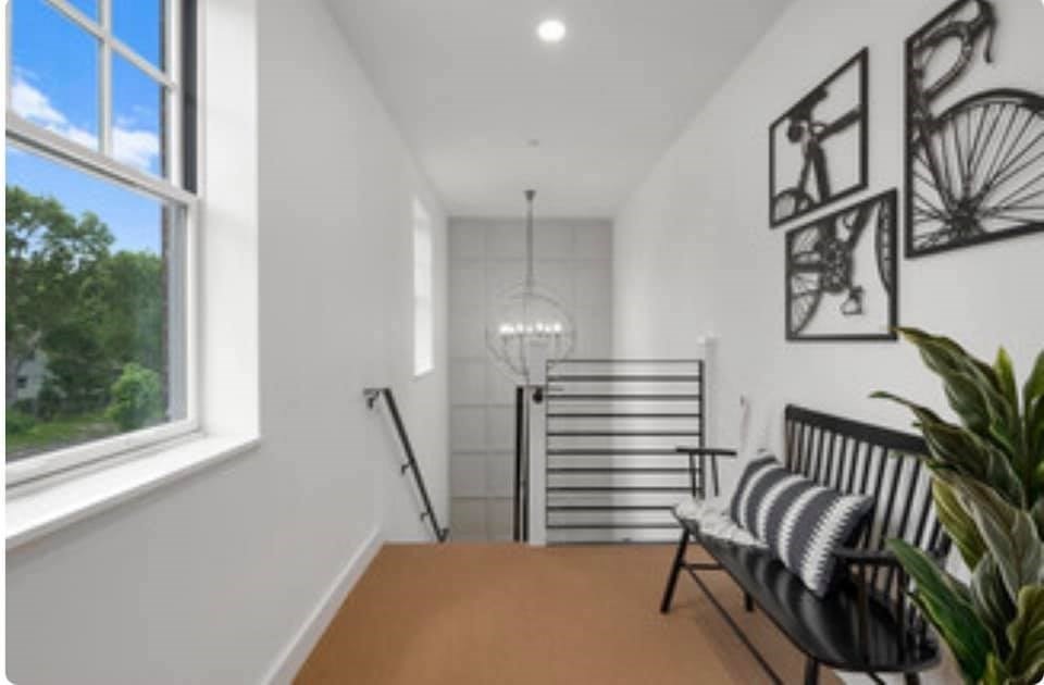 301 North, Unit 7 Wakefield, MA 01880 - Photo 13 of 15 a view of a hallway with stairs and a window