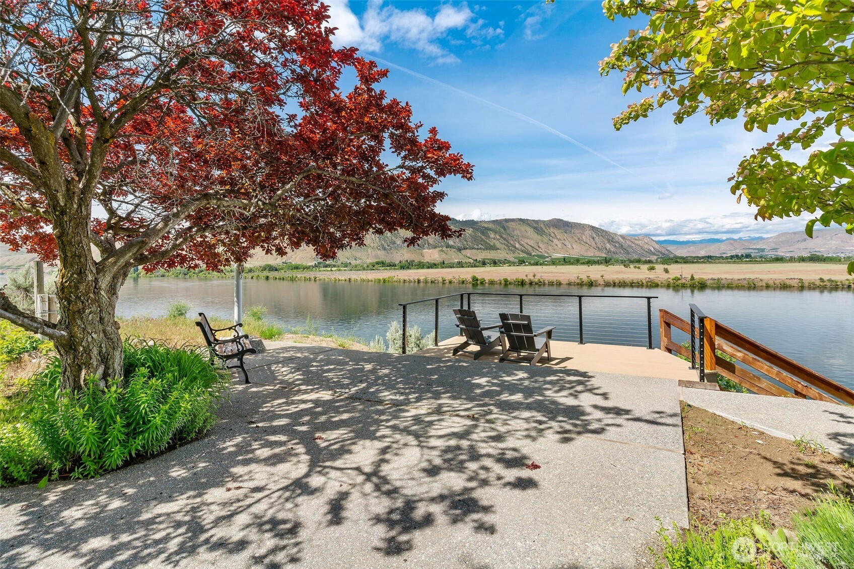 32 Midland Road Brewster, WA 98812 - Photo 34 of 40 a view of a lake with a mountain in the background