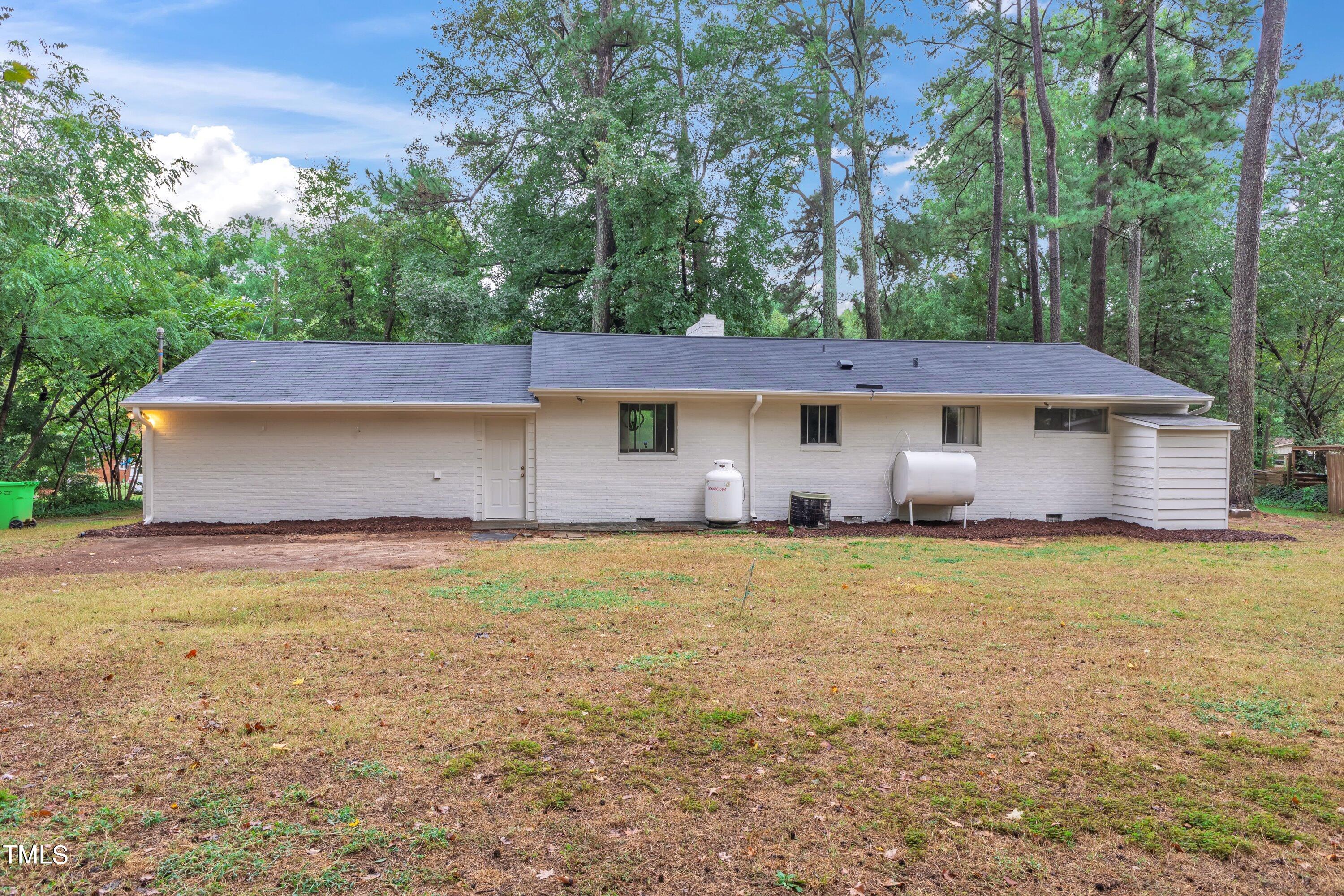 3317 Scott Drive Raleigh, NC 27604 - Photo 27 of 29 front view of a house with a yard