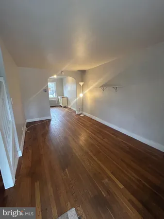 a view of a livingroom with wooden floor