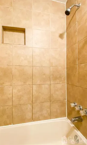 a bathroom with a bathtub