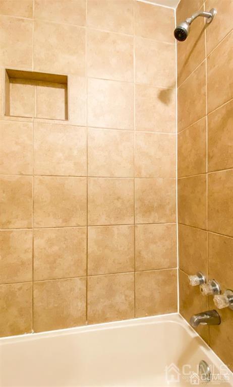 701 Jesse Way Piscataway, NJ 08854 - Photo 14 of 16 a bathroom with a bathtub