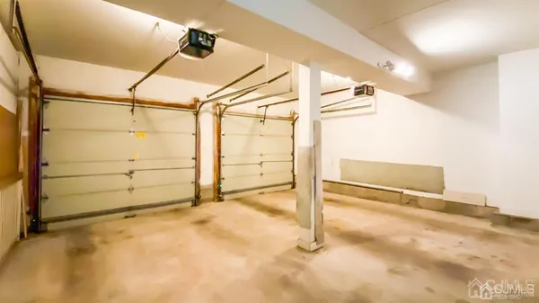 an empty room with white walls