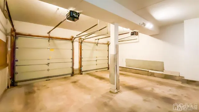 an empty room with white walls