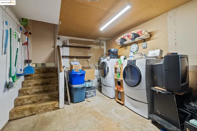 a patio with wooden floor and outdoor seating