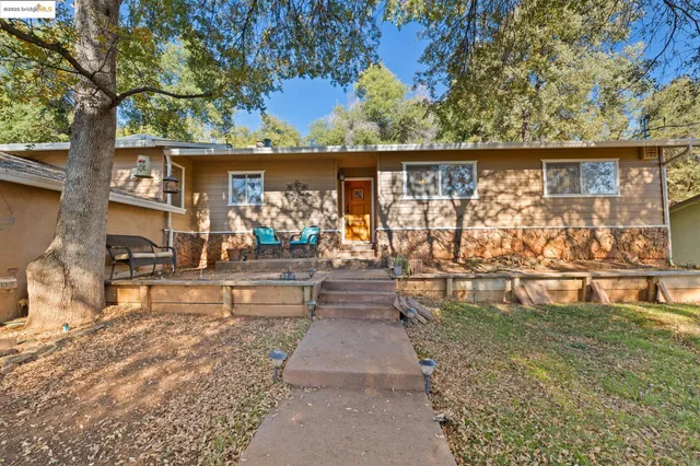 swimming pool view with outdoor seating