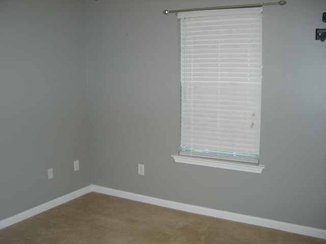 251 Autumn Ridge Trail Gray, GA 31032 - Photo 12 of 16 an empty room with a window