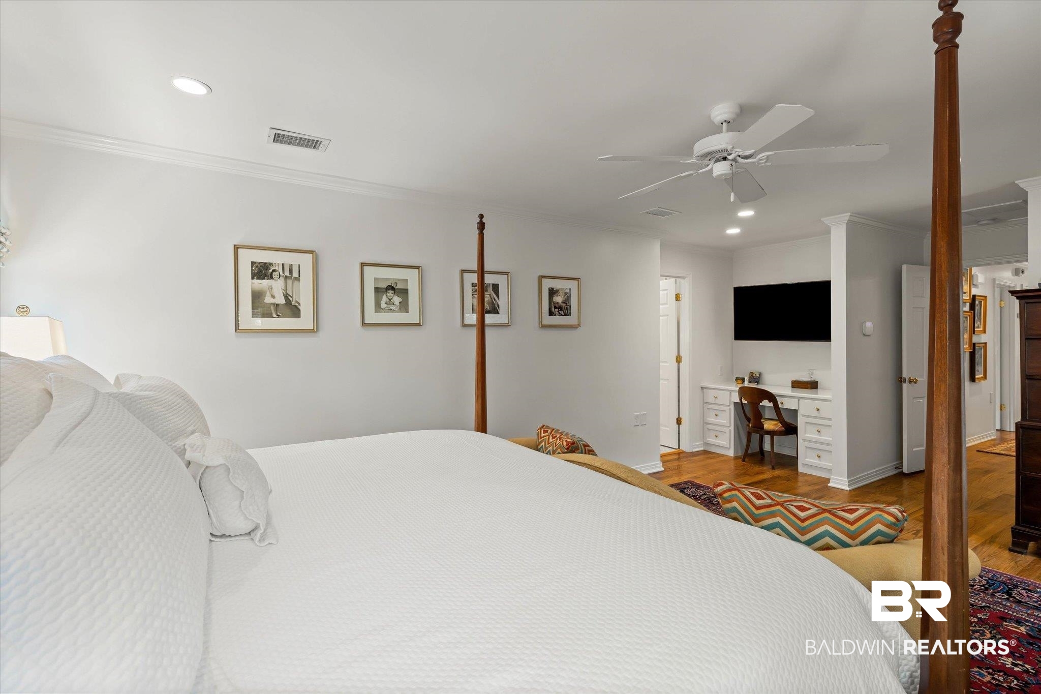 3612 Linden Lane Mobile, AL 36608 - Photo 21 of 42 Bedroom with recessed lighting, wood finished floors, ornamental molding, built in study area, and a ceiling fan
