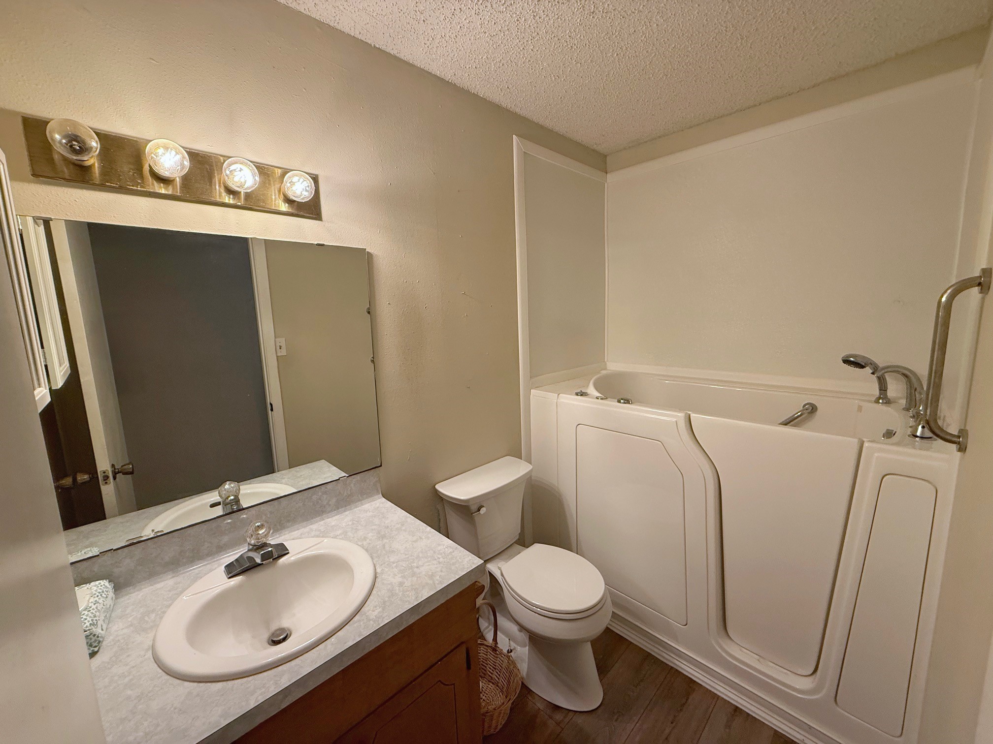 129 Stewart Street Centerville, TX 75833 - Photo 17 of 21 a bathroom with a sink a toilet and mirror