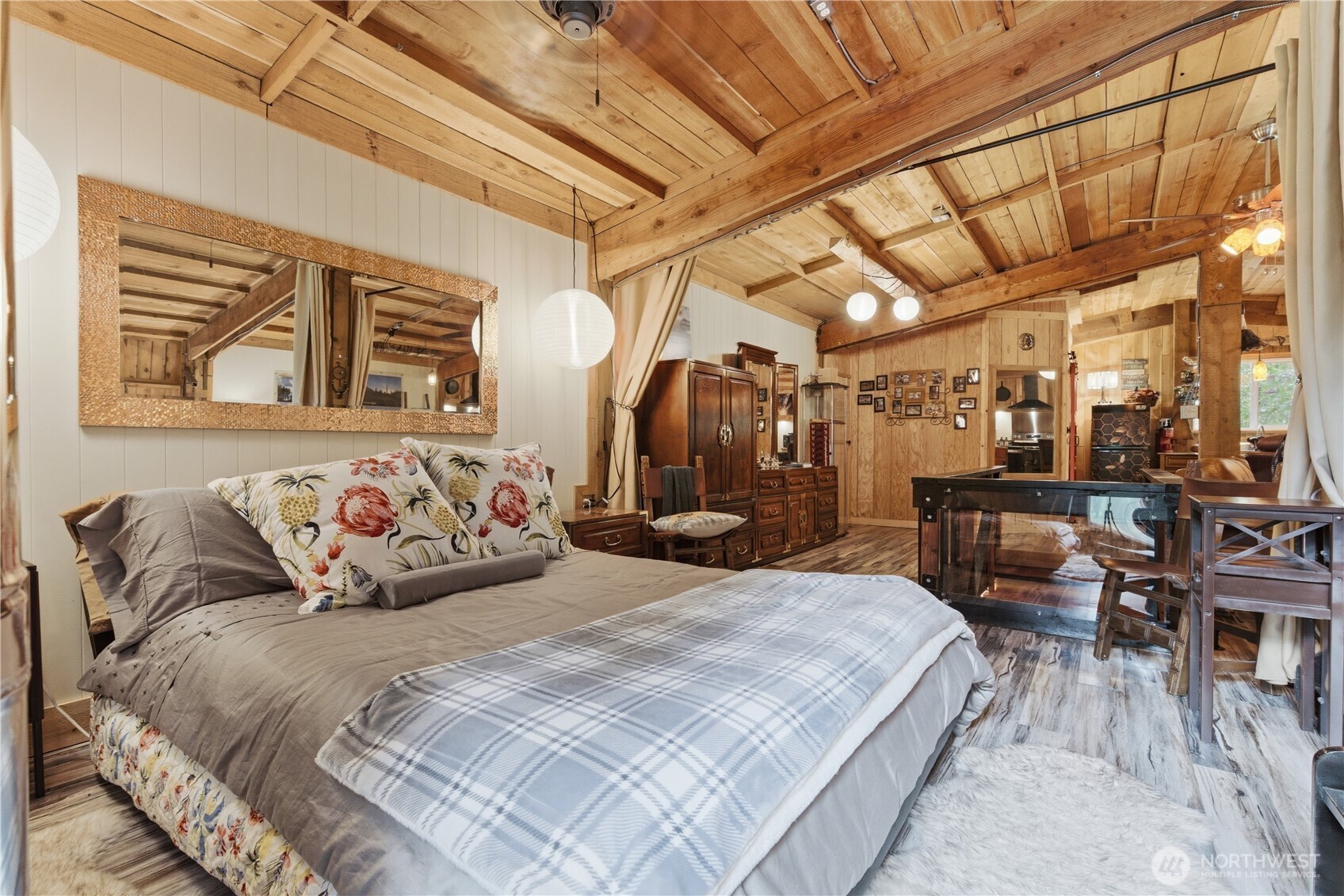 3320 Duckabush Road Brinnon, WA 98320 - Photo 19 of 38 a bedroom with bed and wooden floor
