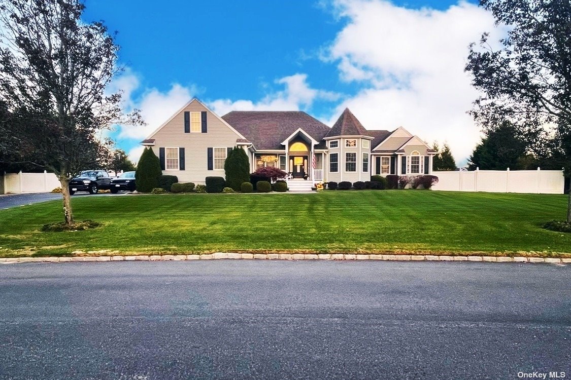 136 Meadow Path Wading River, NY 11792 - Photo 1 of 1 a view of a big house with a big yard and large trees