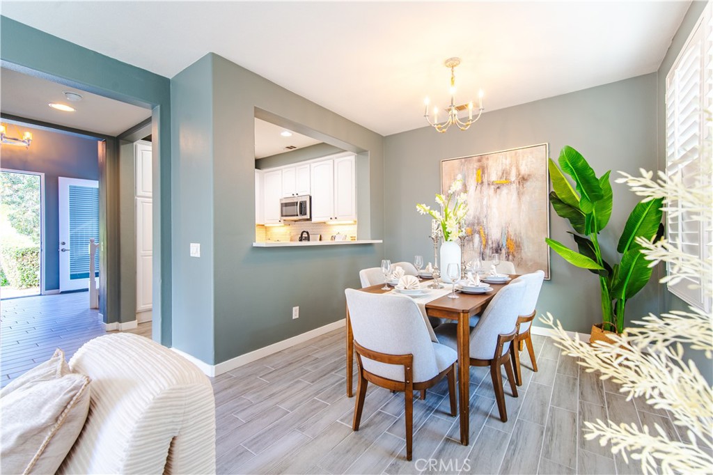 21 Thorp Ladera Ranch, CA 92694 - Photo 12 of 43 a view of a dining room with furniture window and wooden floor