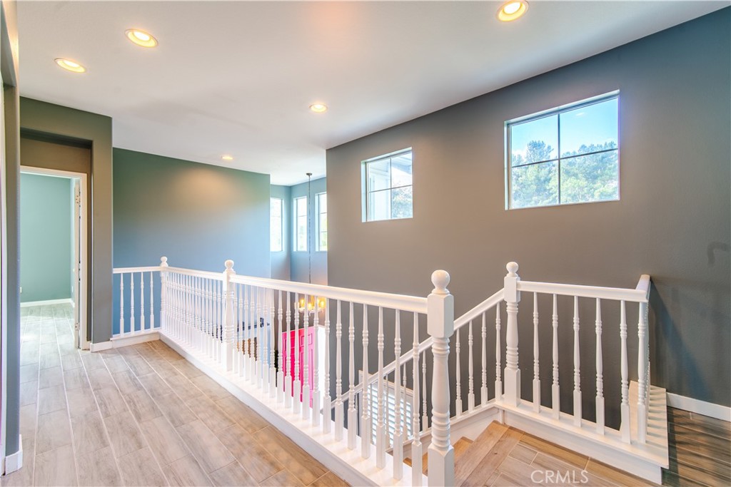 21 Thorp Ladera Ranch, CA 92694 - Photo 20 of 43 a view of hallway with wooden floor