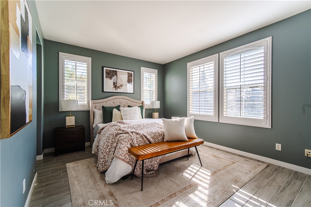 21 Thorp Ladera Ranch, CA 92694 - Photo 24 of 43 a bed sitting in a bedroom next to a window