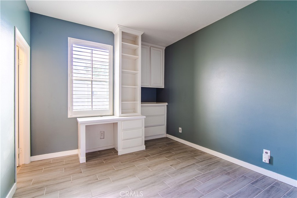 21 Thorp Ladera Ranch, CA 92694 - Photo 31 of 43 an empty room with wooden floor and window