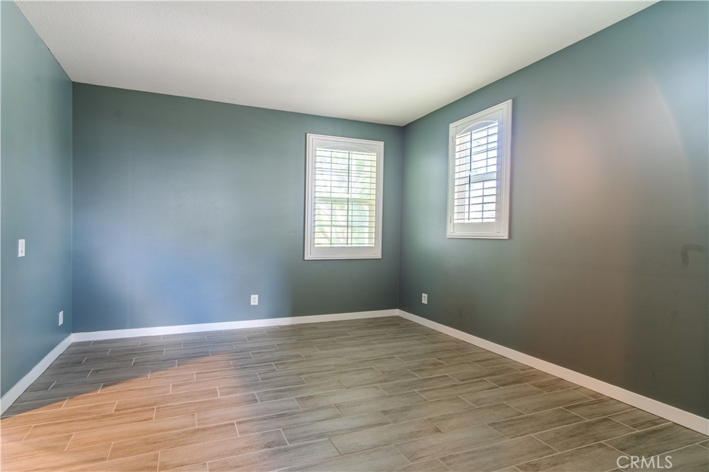 21 Thorp Ladera Ranch, CA 92694 - Photo 35 of 43 a view of empty room with wooden floor