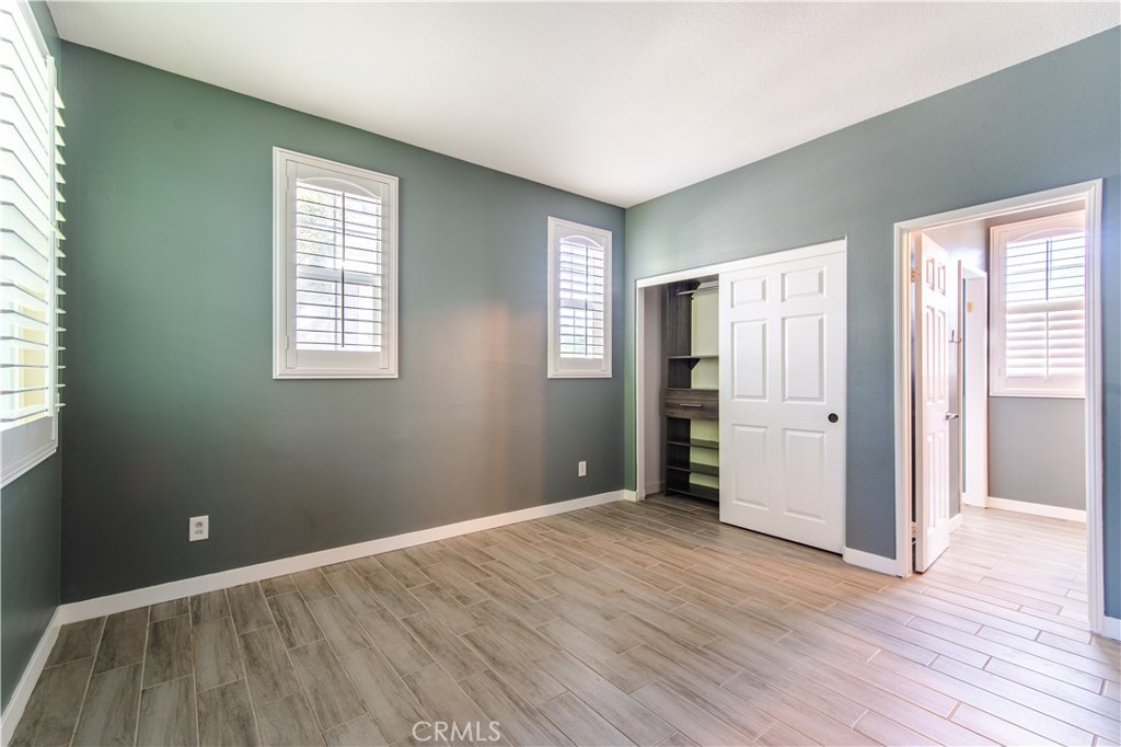 21 Thorp Ladera Ranch, CA 92694 - Photo 36 of 43 a view of an empty room with wooden floor and a window