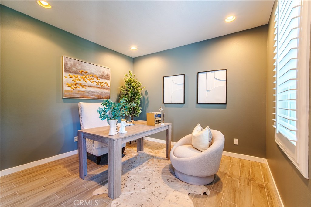 21 Thorp Ladera Ranch, CA 92694 - Photo 8 of 43 a work room with furniture and a potted plant