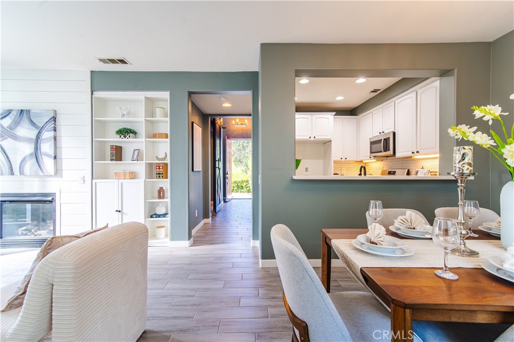 21 Thorp Ladera Ranch, CA 92694 - Photo 9 of 43 a dining room with furniture and wooden floor