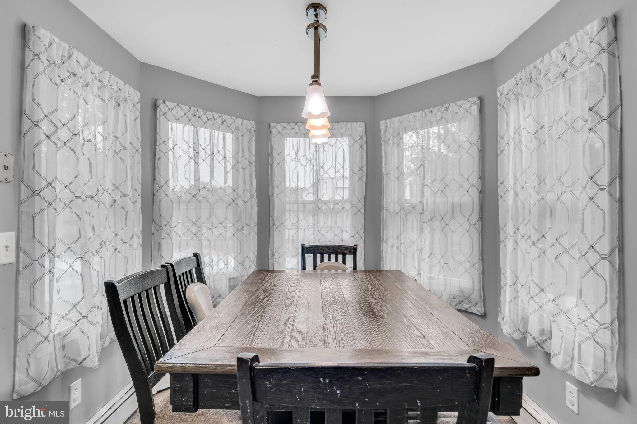 16 Hill Road Carlisle, PA 17015 - Photo 15 of 36 a view of a dining room with furniture window and outside view