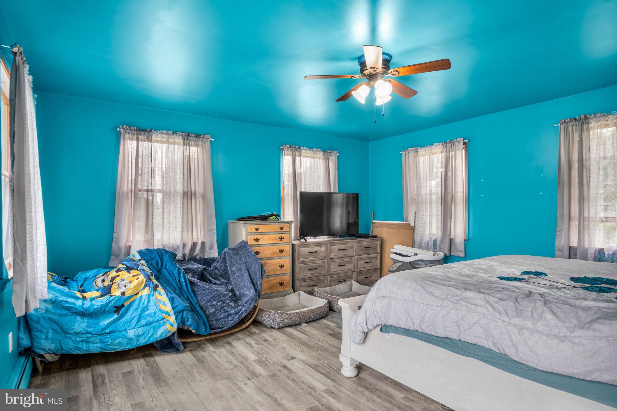 16 Hill Road Carlisle, PA 17015 - Photo 16 of 36 a bedroom with furniture and a large window