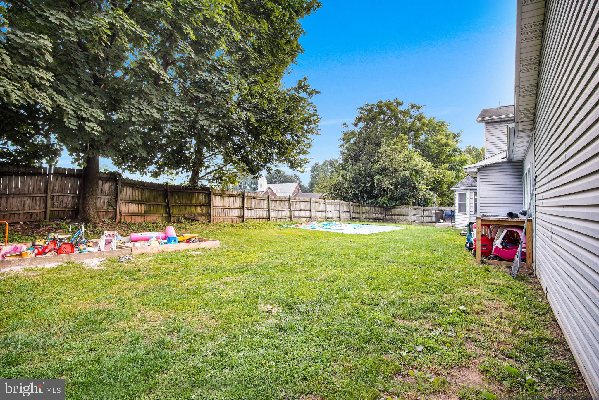16 Hill Road Carlisle, PA 17015 - Photo 32 of 36 a view of a backyard with a garden and entertaining space