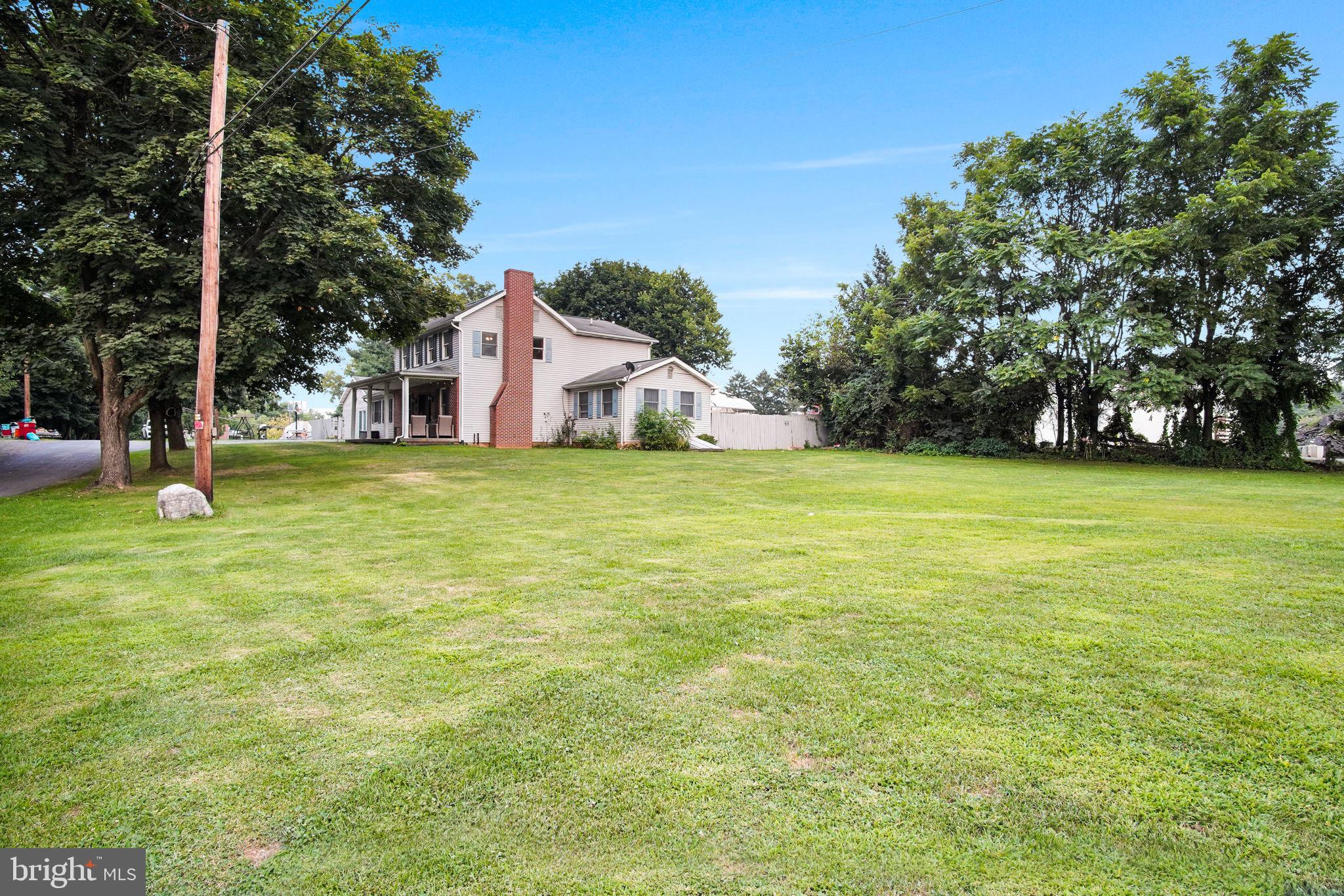 16 Hill Road Carlisle, PA 17015 - Photo 4 of 36 a view of a tree in front of a house