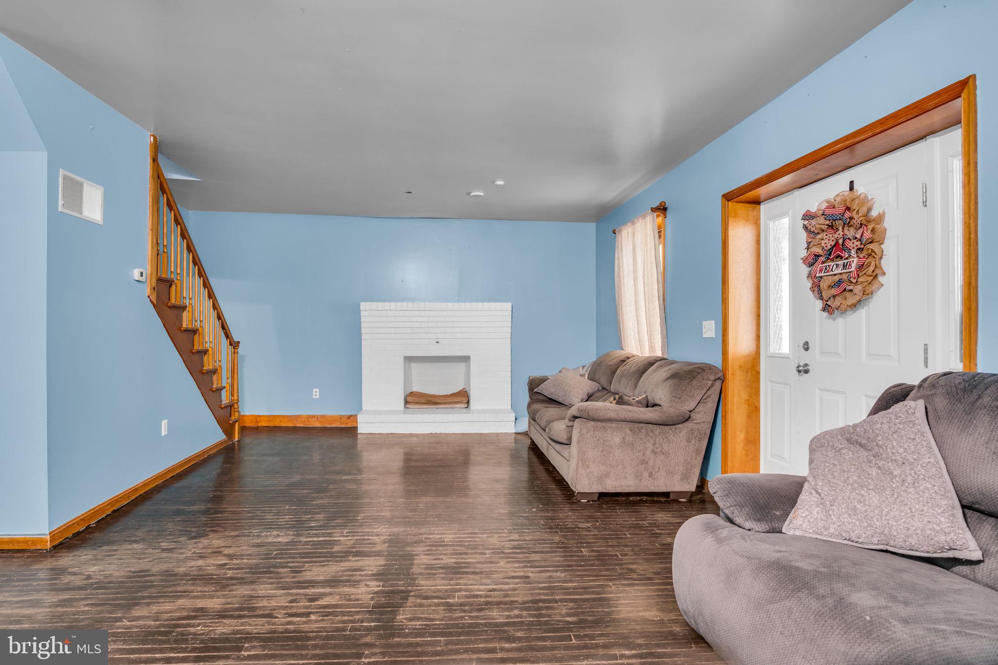 16 Hill Road Carlisle, PA 17015 - Photo 10 of 36 a living room with furniture and a rug