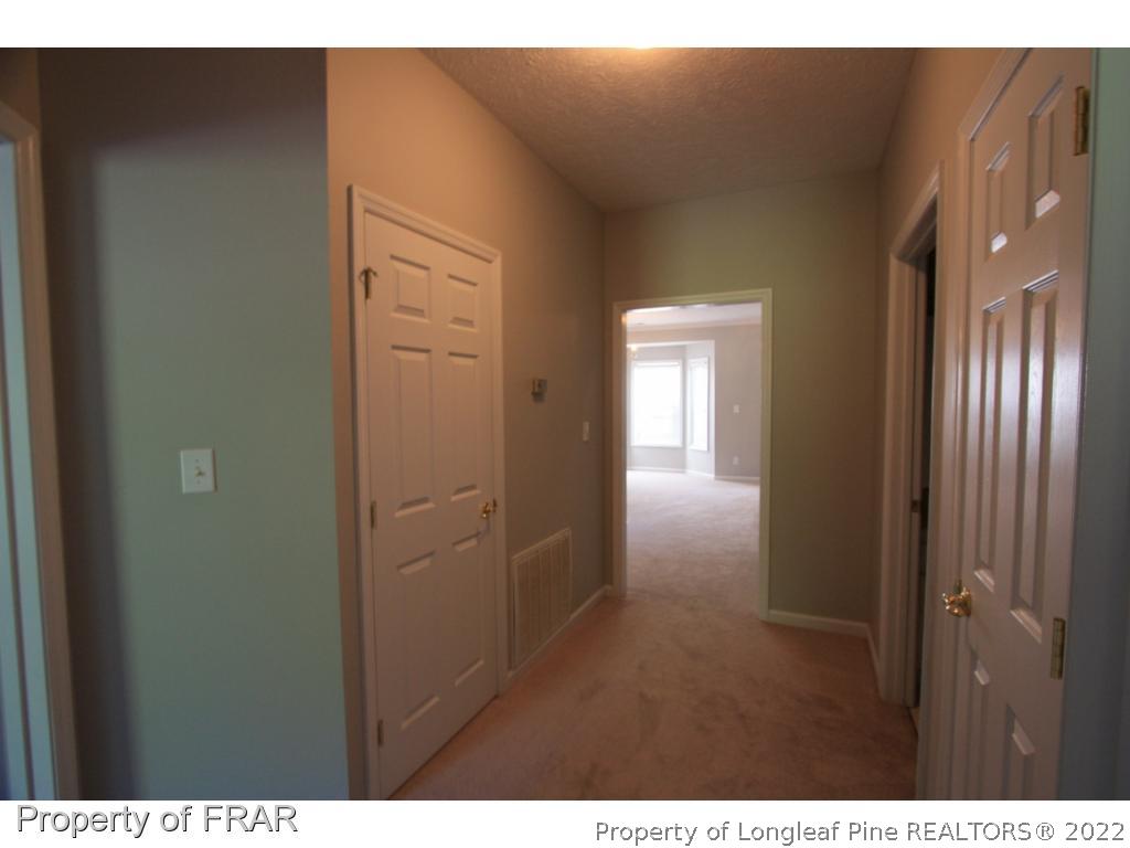 522-6 Lionshead Road Fayetteville, NC 28311 - Photo 15 of 19 a view of hallway with stairs