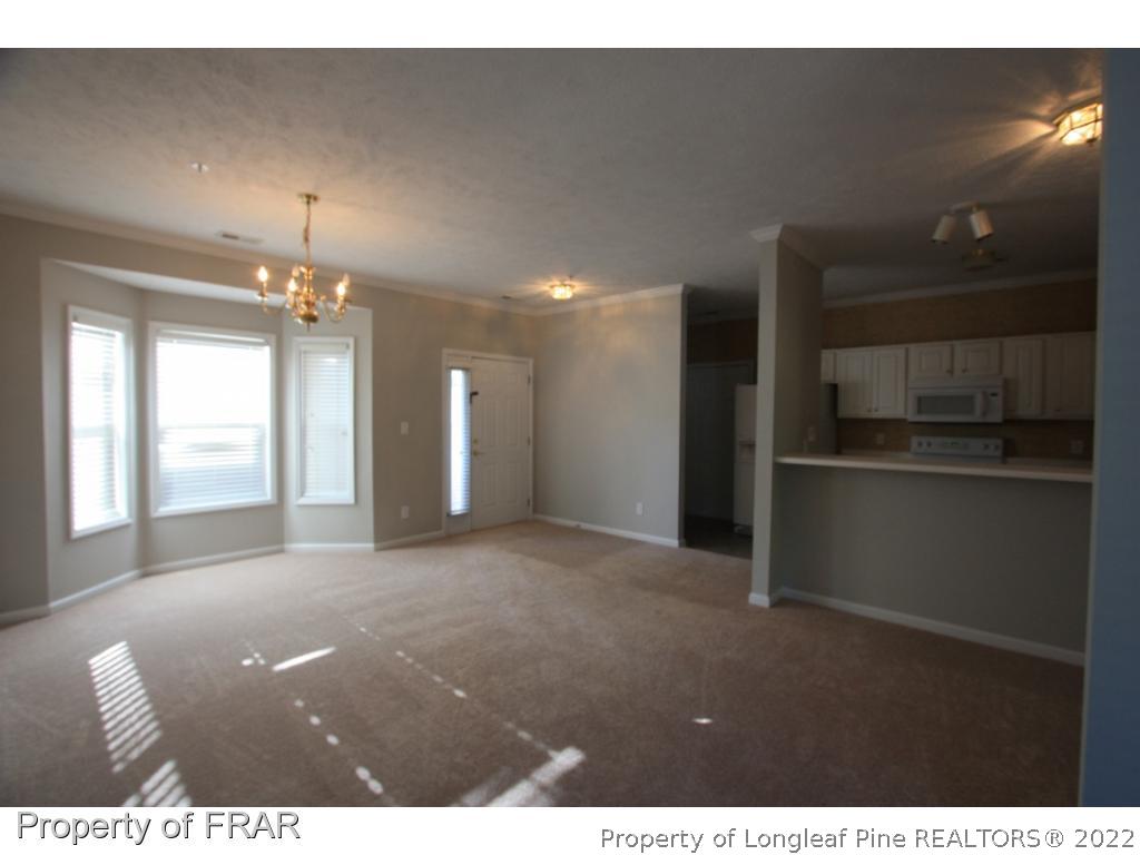 522-6 Lionshead Road Fayetteville, NC 28311 - Photo 3 of 19 a view of an empty room with a kitchen