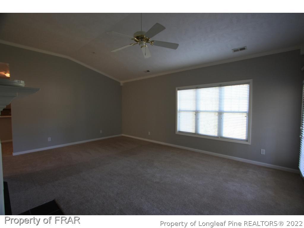 522-6 Lionshead Road Fayetteville, NC 28311 - Photo 7 of 19 a view of an empty room with a window