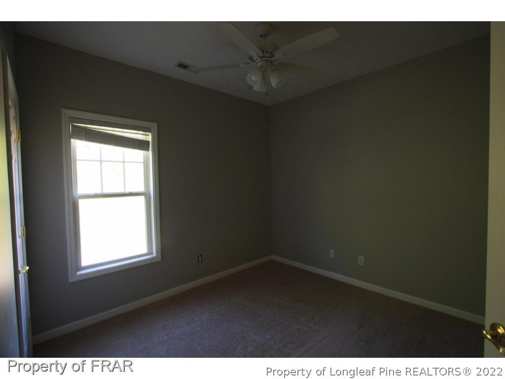 522-6 Lionshead Road Fayetteville, NC 28311 - Photo 10 of 19 a view of an empty room with a window
