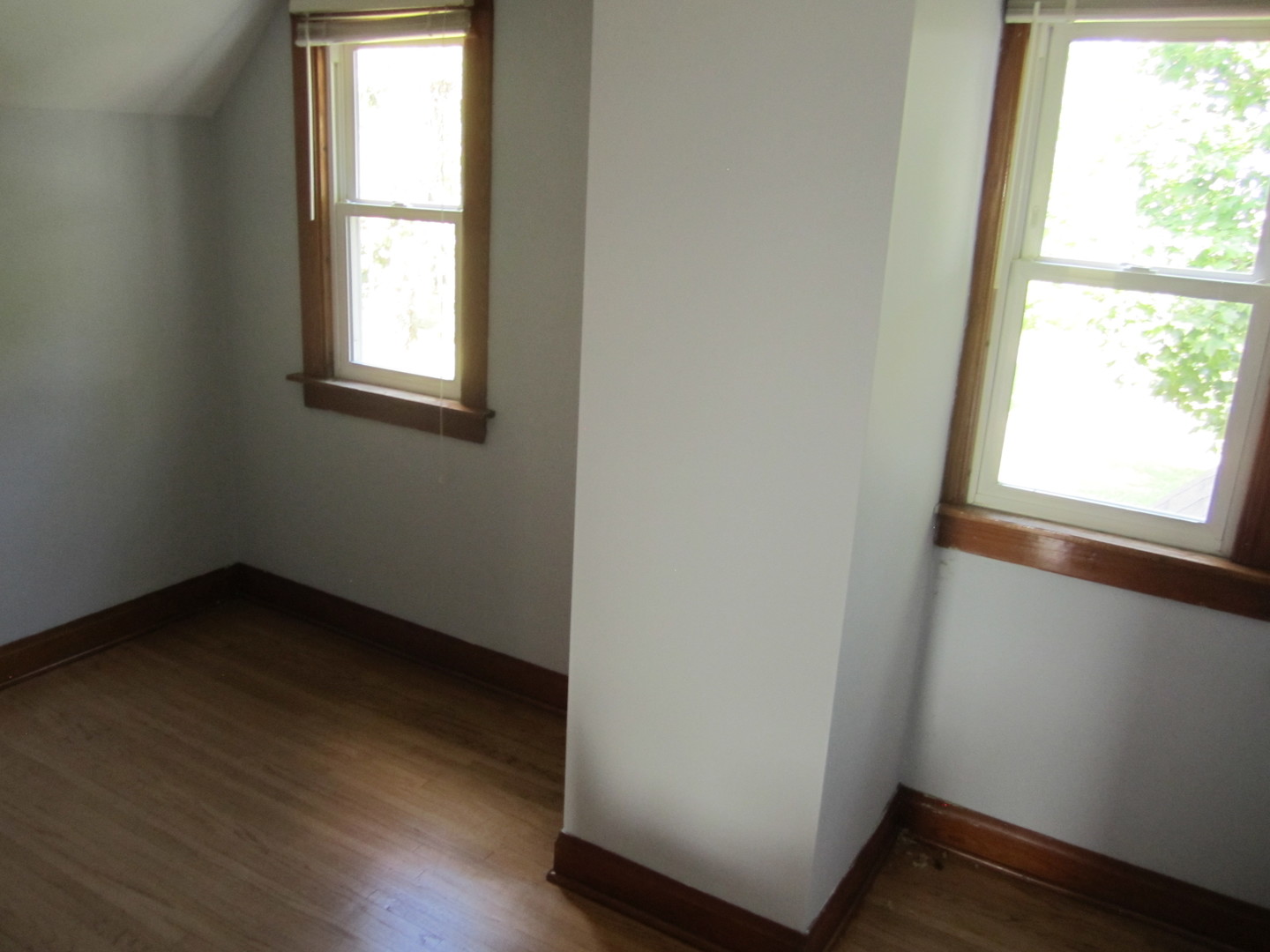 38 Highway Maple Park, IL 60151 - Photo 18 of 29 an empty room with wooden floor and windows